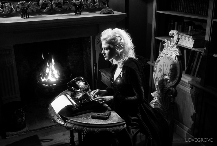 10. This shot features my Remington typewriter and a Bakerlite phone I bought on Ebay. The exposure was set by the roaring fire. The lighting was then set to correctly expose Chloe-Jasmine in situ. I used an Arri 300 as her key light and the Arri 150 as her back light.