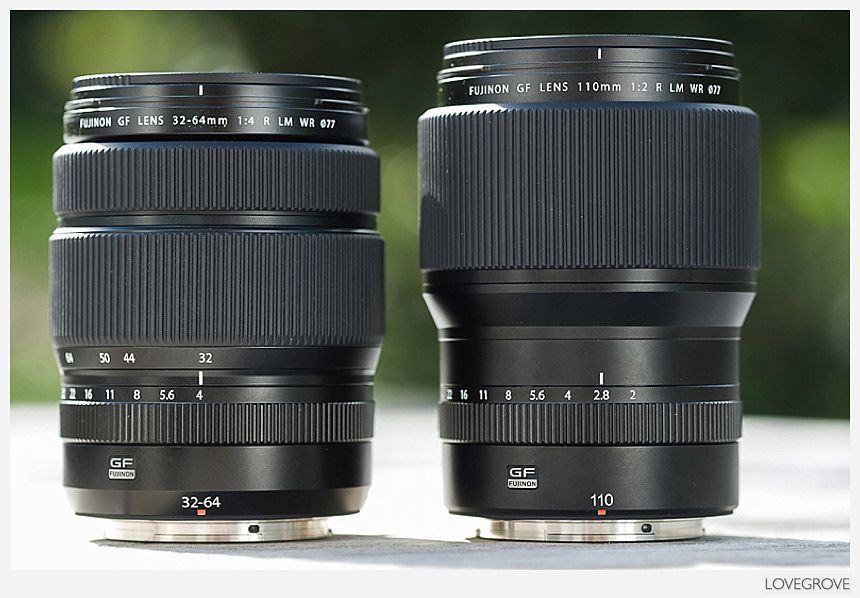 A side by side comparison of a Fujifilm GF 32-64mm lens and a GF 110mm f/2 lens