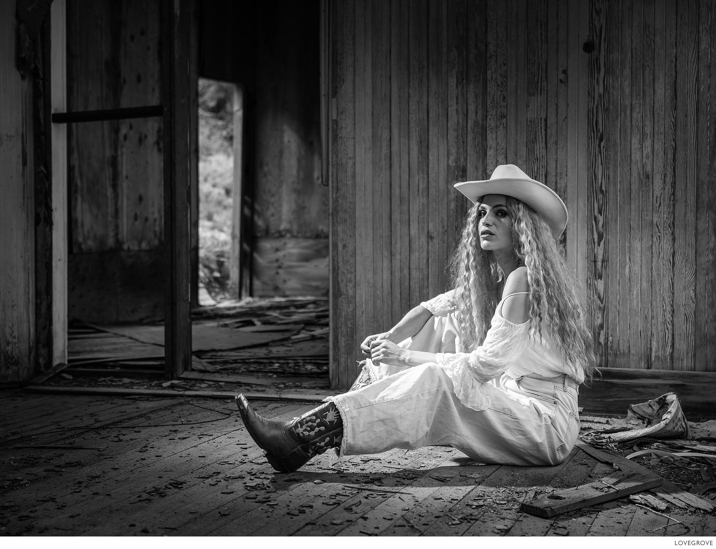 Deserts-and-Gold-Dust-122-2 A girl sits in an abonded ore crushing mill