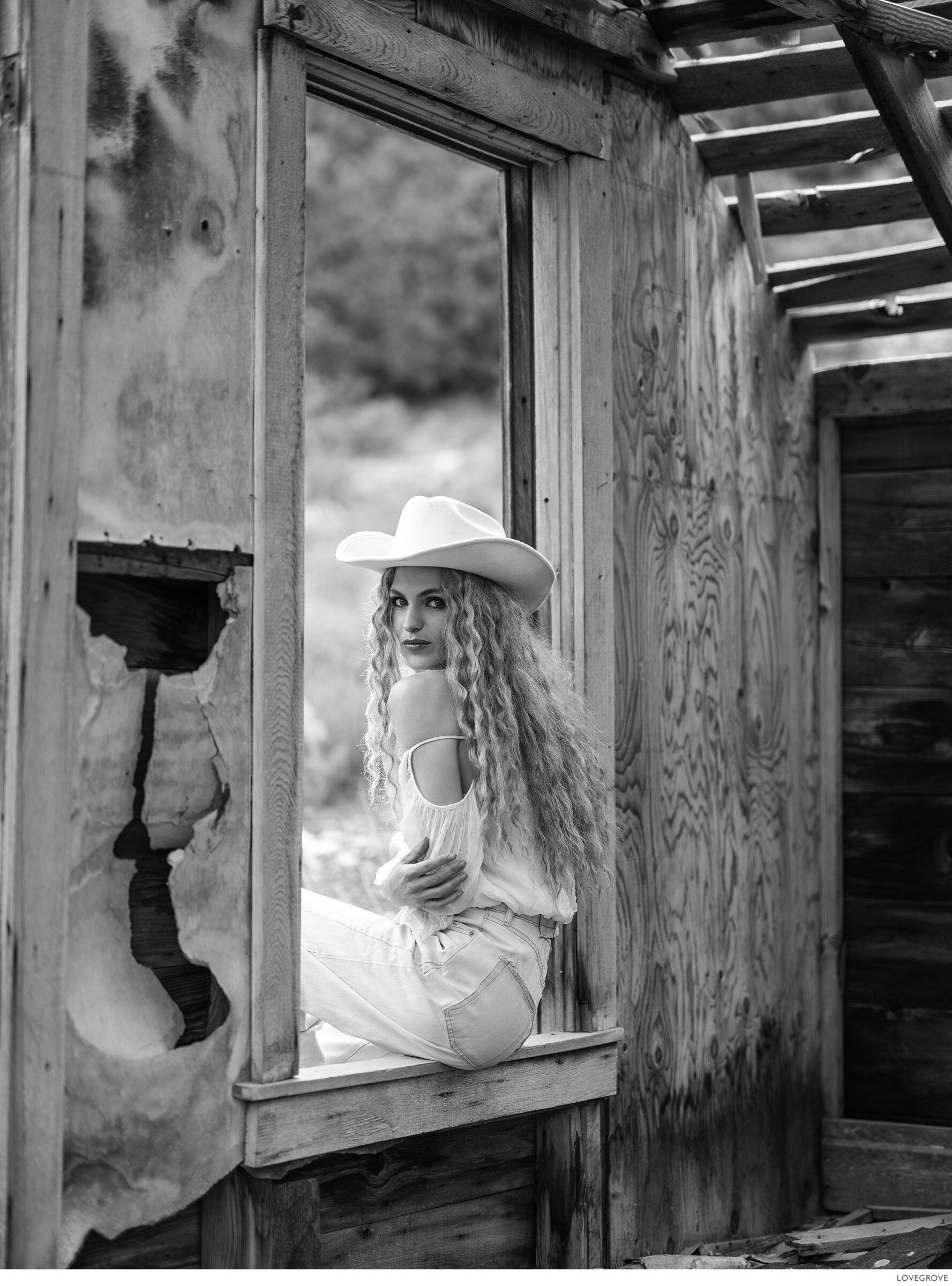 Deserts-and-Gold-Dust-134-2 A girl sits in an abonded ore crushing mill